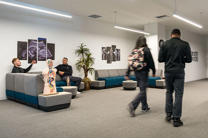 Casa Loma - students walking in lounge